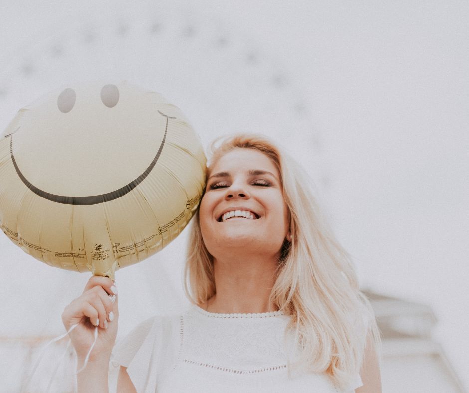 Lady with a happy face, balloon